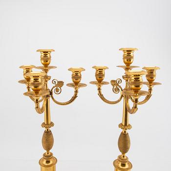 A pair of Empire style candelabras first half of the 20tyh century.