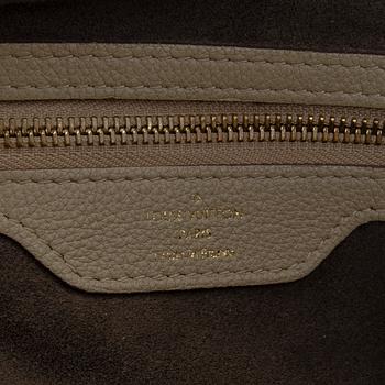 Louis Vuitton, a 'Mahina Galatea MM' bag.
