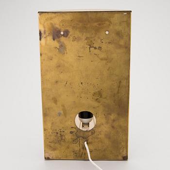 A mid 20th century '3061' wall light for Stockmann Orno, Finland.