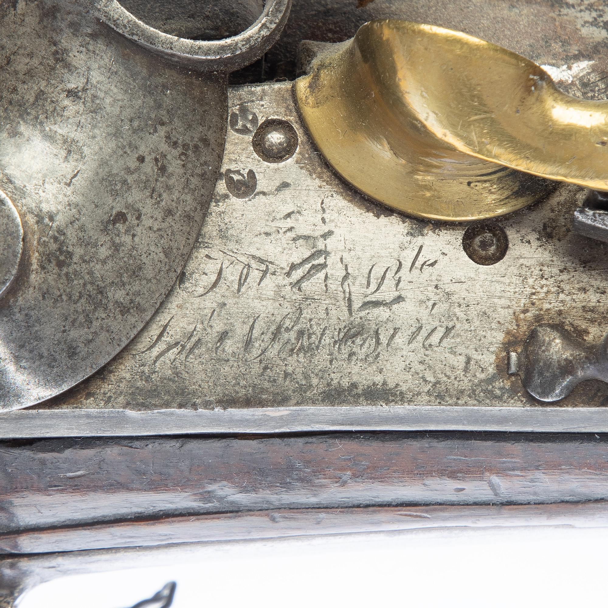 Flintlock rifle, 18th century.