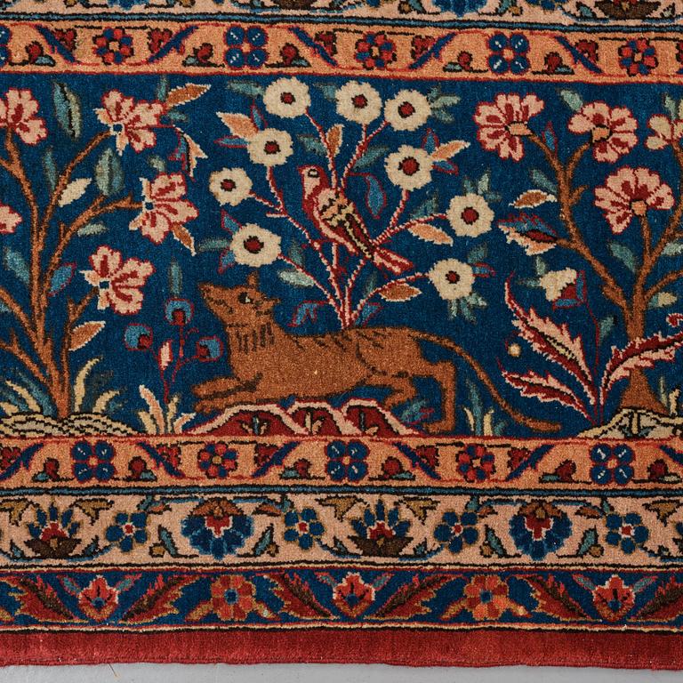 A carpet, a semi-antique Kashan, a so called Dabir, ca 383,5-387,5 x 269,5-275 cm.