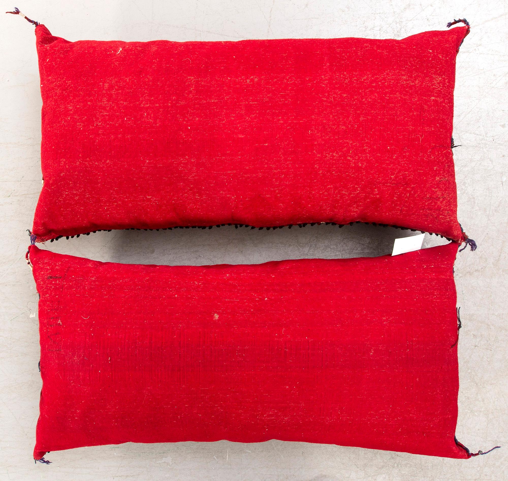 A pair of Tekke Turkmen cushions 125x58 cm each.