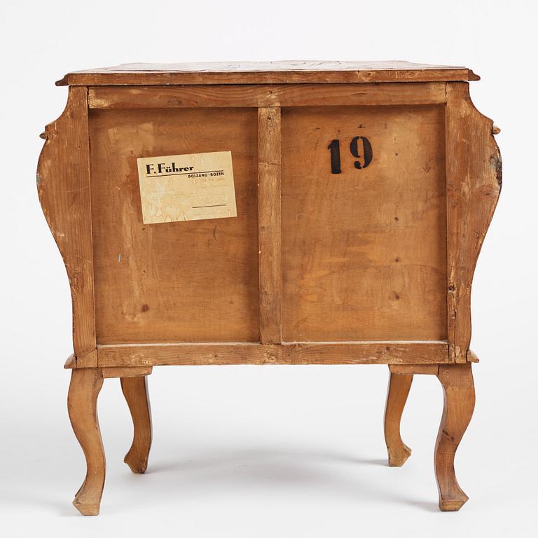 An Italian Louis XV-style bombé commode, later part 19th century.