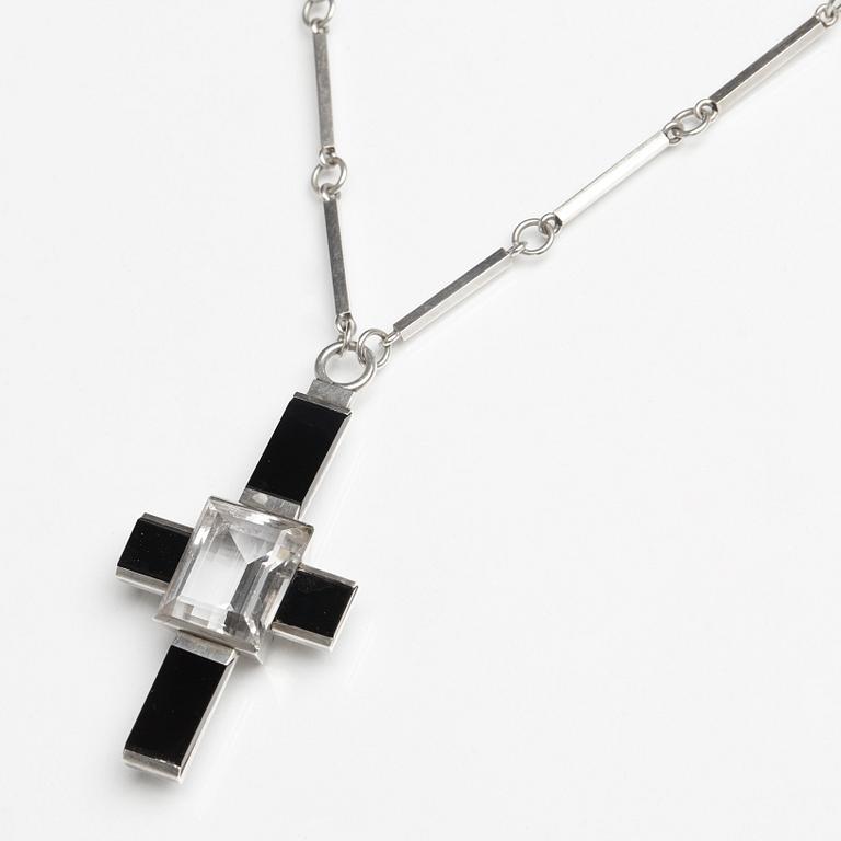 Wiwen Nilsson, a crucifix pendant and chain, sterling silver with facet cut rock crystal and onyx, Lund, Sweden 1935.