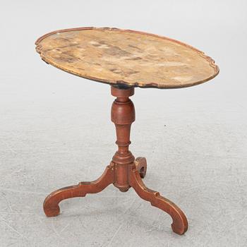 A folding table, 19th century.