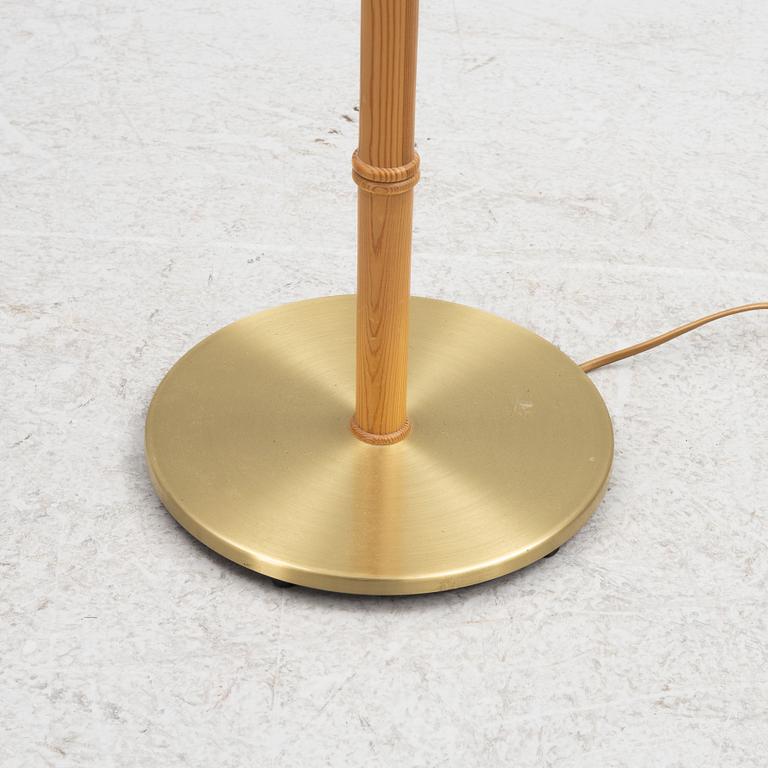 A brass and pine floor light from Falkenbergs, second part of the 20th Century.