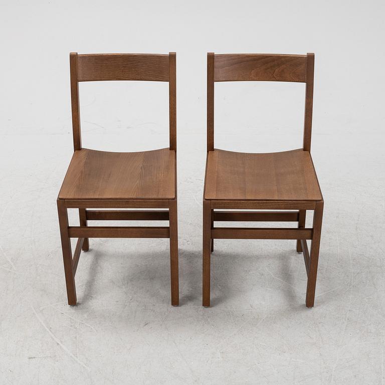 A pair of stained beech 'Waiter Chair' by Chris Martin for Massproductions.