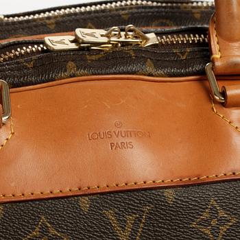 LOUIS VUITTON, a monogram canvas bag / garment cover.