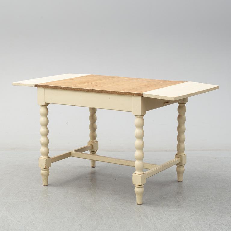 A set of table and two chairs, baroque-style, 20th century.