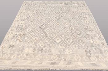 A carpet, kilim, ca 287 x 218 cm.