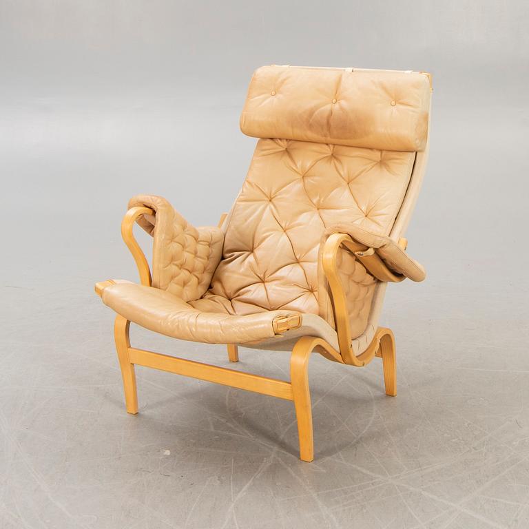A Bruno Mathsson "Pernilla" leather easy chair for DUX later part of the 20th century.