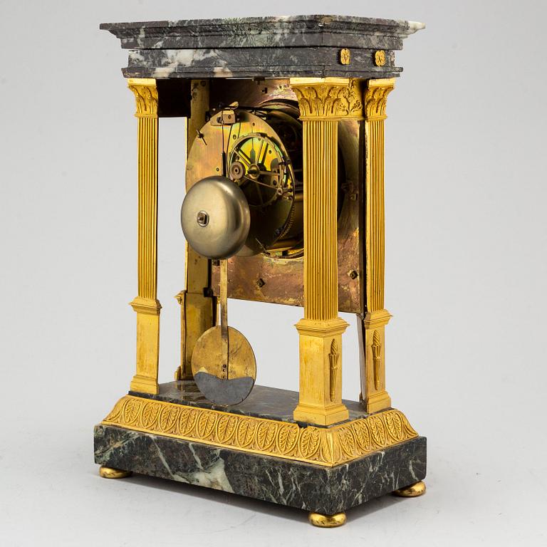 A French mantel clock, first half of the 19th century.