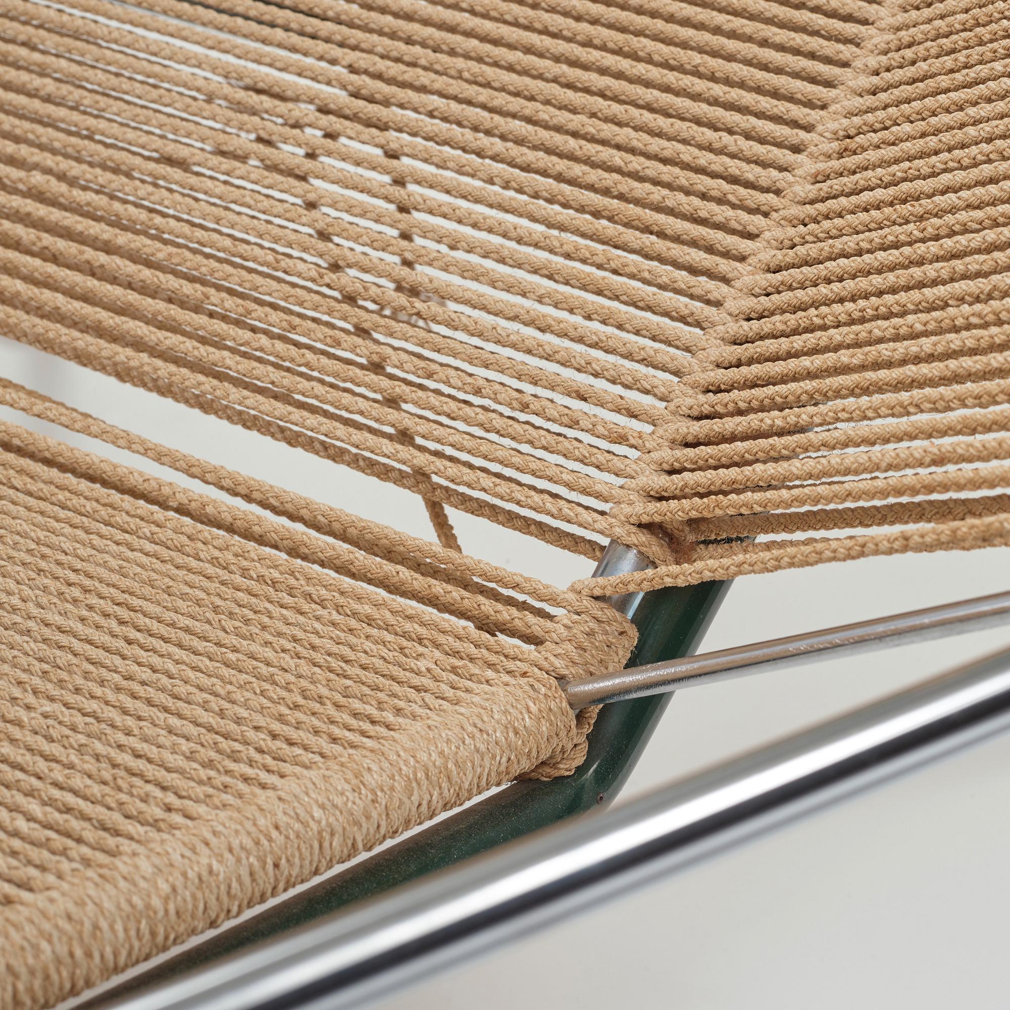 Hans J. Wegner, a 'Flag Halyard' easy chair, Getama, Denmark.