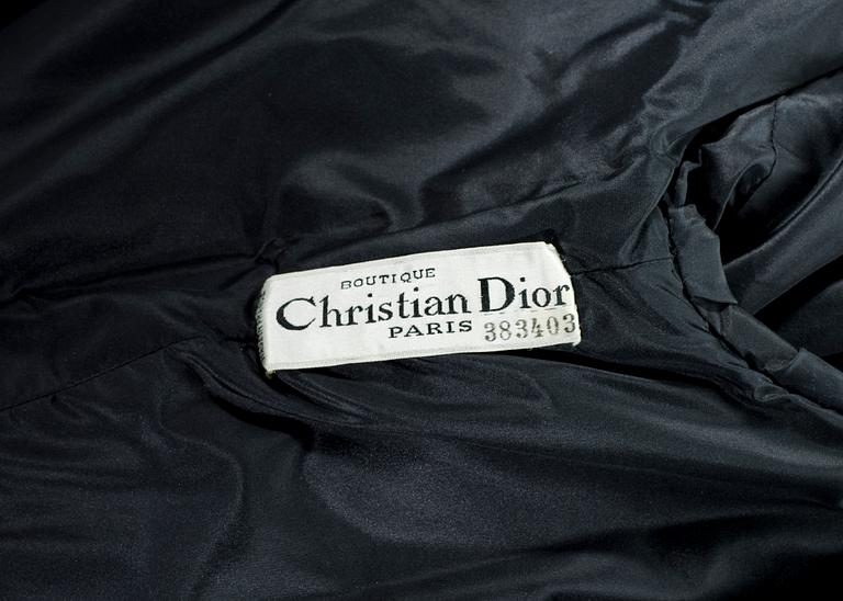 A 1950s/60s black silk coat by Christian Dior.