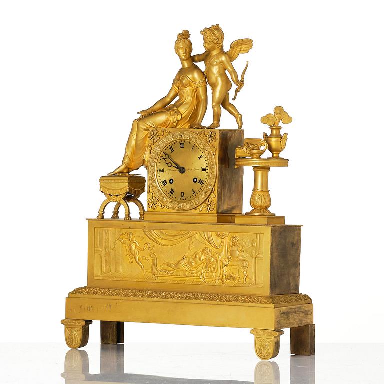 A French Empire ormolu mantel clock, early 19th century.
