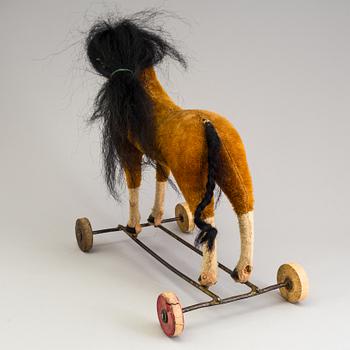 LEKSAKSHÄST, på hjul, 1900-talets början.