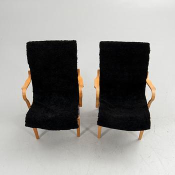 Bruno Mathsson, armchairs, a pair, "Eva", Bruno Mathsson International, Värnamo, second half of the 20th century.