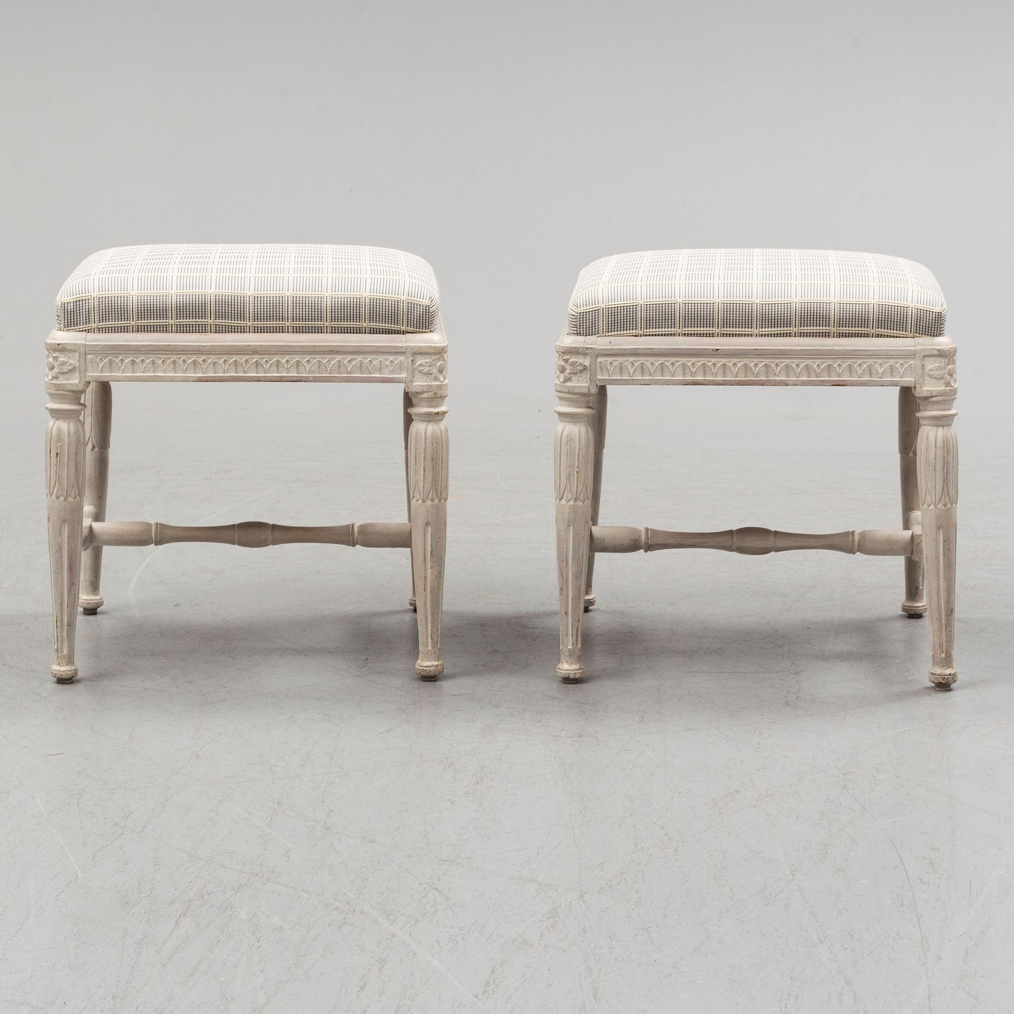 A pair of gustavian late 18th century stools by Erik Öhrmark (master in Stockholm 1777-1813).