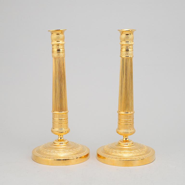 A pair of french Empire candlesticks, first half of the 19th Century.