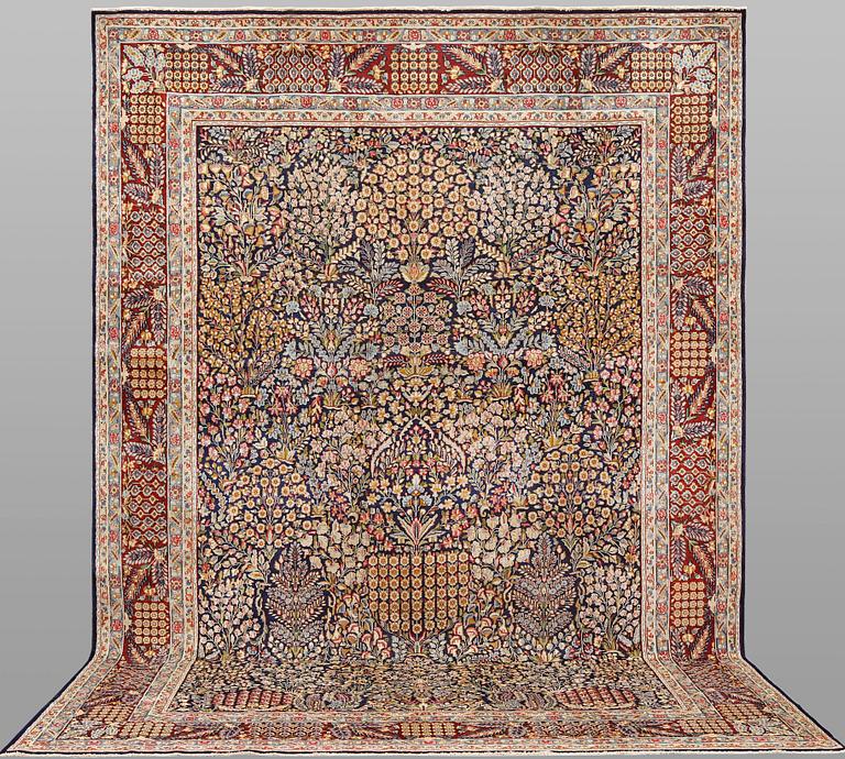 A 'Millefleur' Kerman carpet, c. 393 x 266 cm.