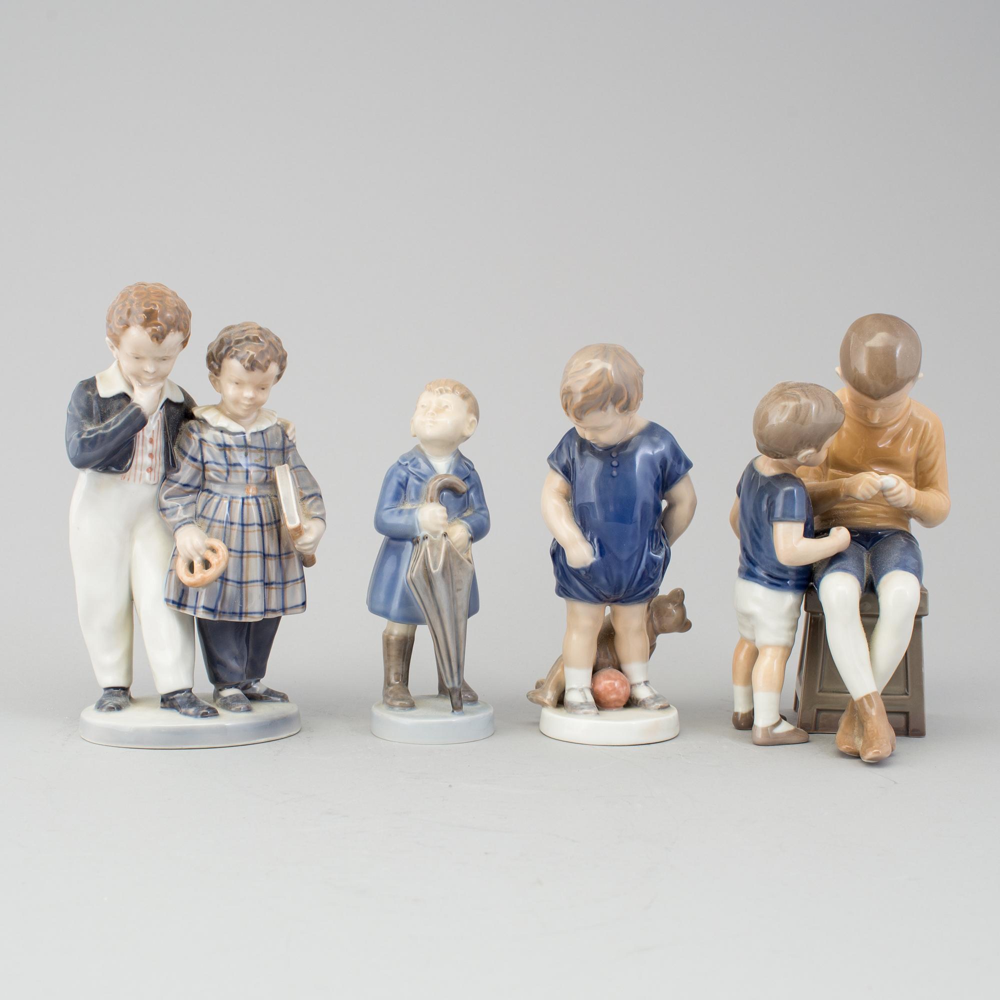 BING & GRØNDAHL & ROYAL COPENHAGEN, four porcelain figurines, late 20 th century.