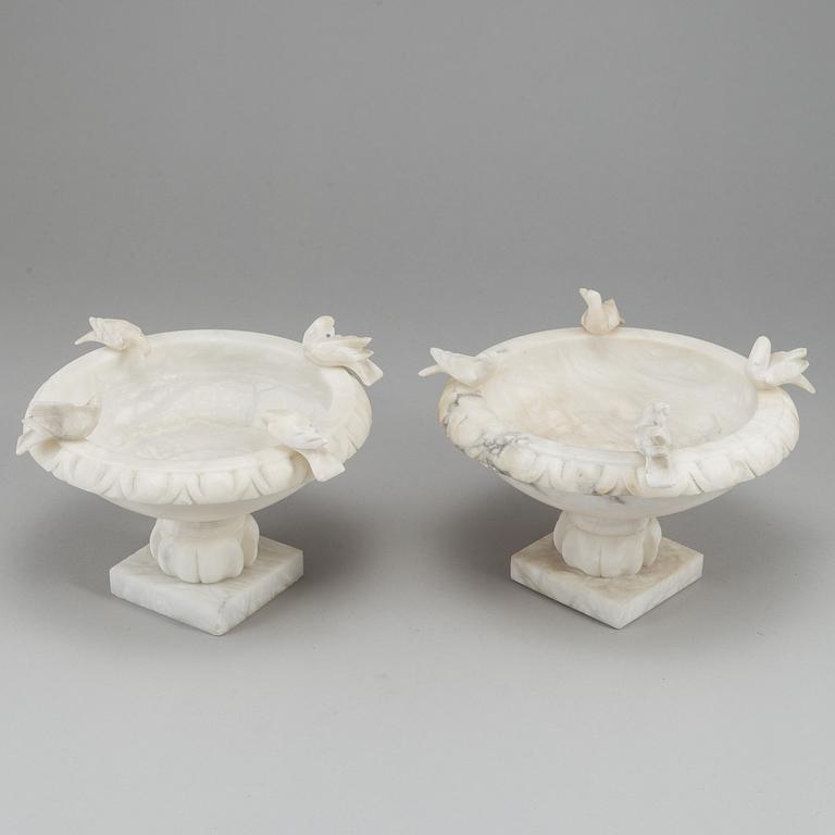 A pair of 20th century alabaster bowls or birdbaths.
