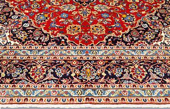 A Keshan carpet, approx. 395 x 300 cm.