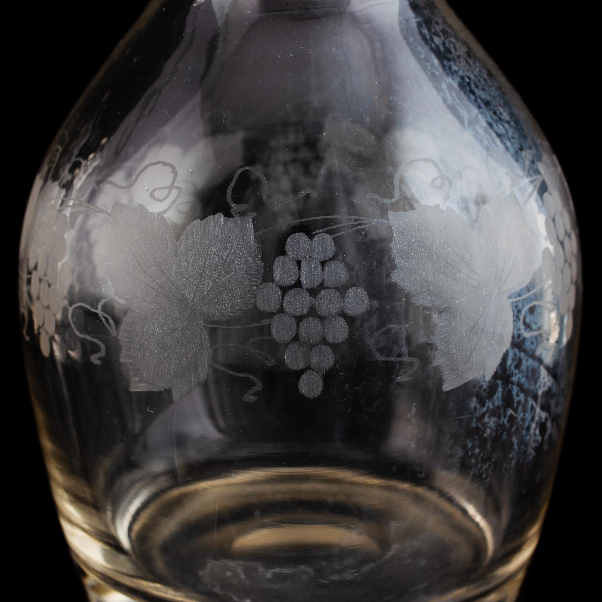 A pair of mid 19th century glass decanters and stoppers.