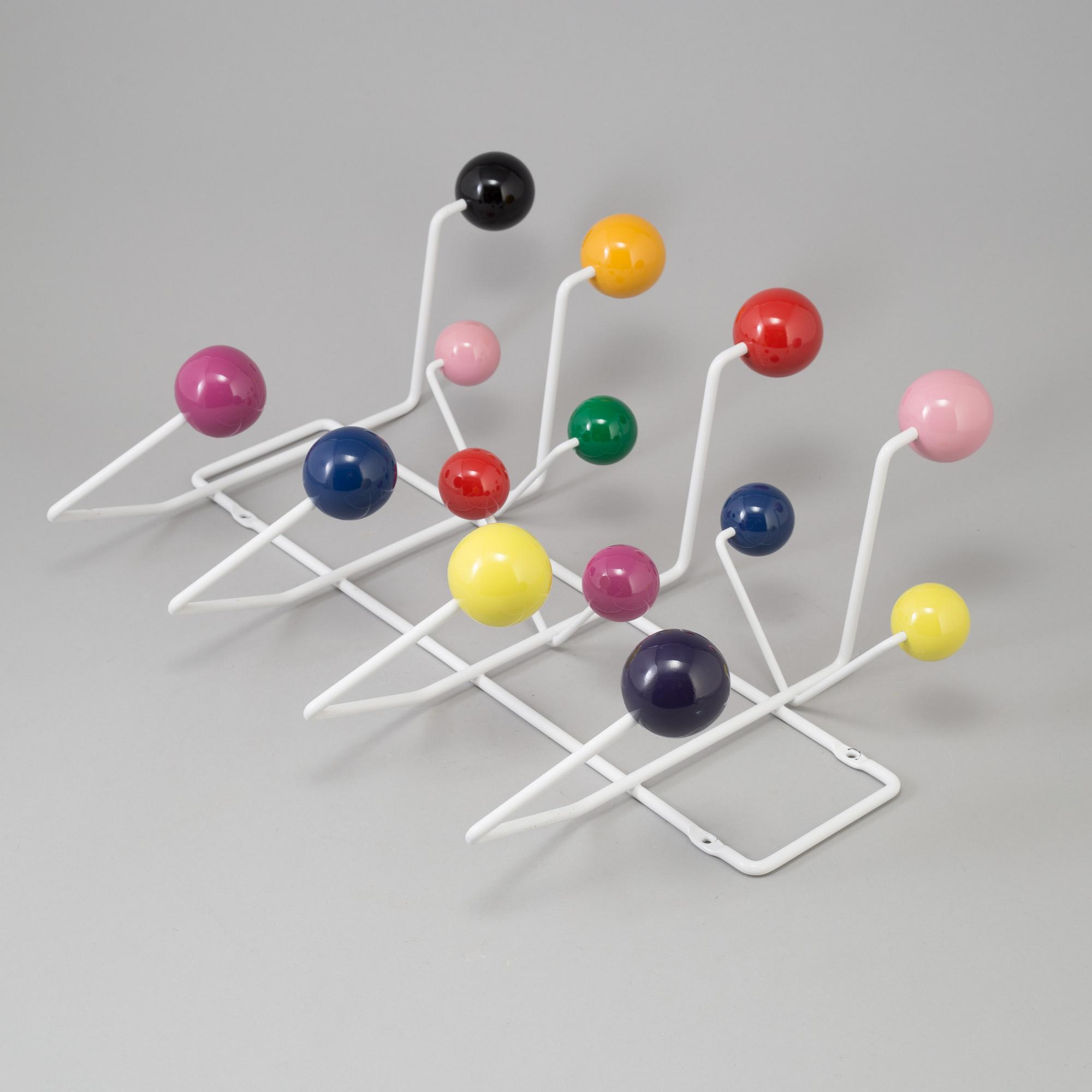 a "Hang it all" clothes hanger by Charles & Ray Eames for Vitra.