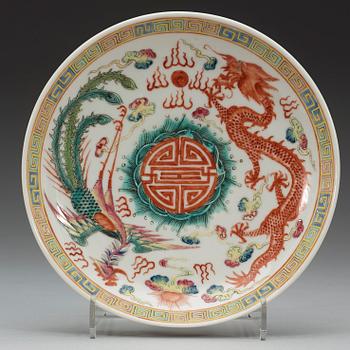 A set of three phoenix and dragon famille rose dish, Qing dynasty with Guangxu six character mark and period (1875-1908).
