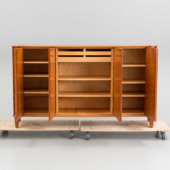 A 20th century mahogany sideboard with four doors.