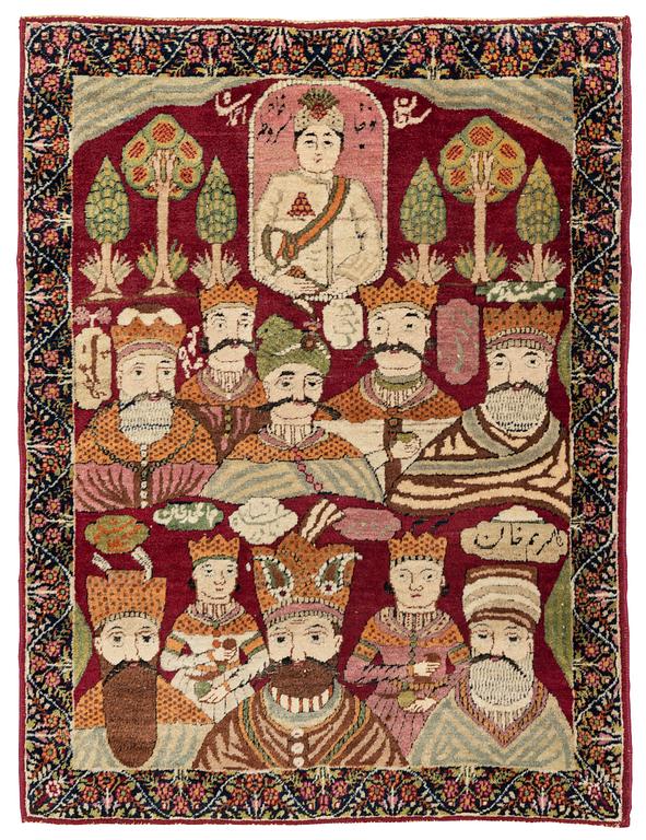 A Persian Kerman Laver 'Mashahir' ('The rulers of the world') rug, c. 82 x 63 cm.