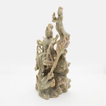 A large soapstone sculpture group of Guanyin, 20th century.