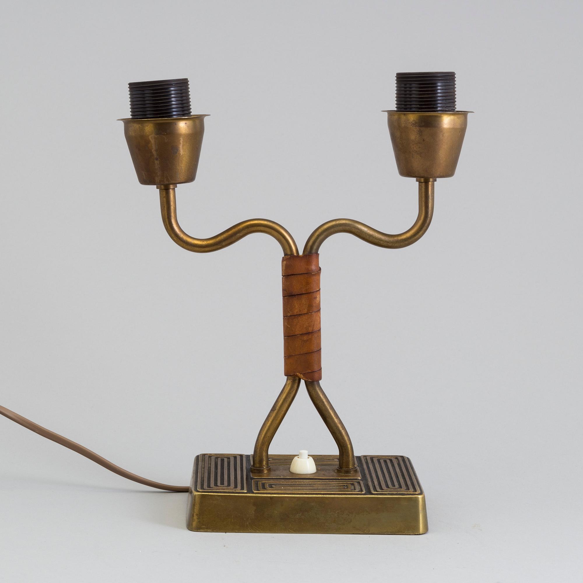 A 1940s Sonja Katzin brass table light from Asea.