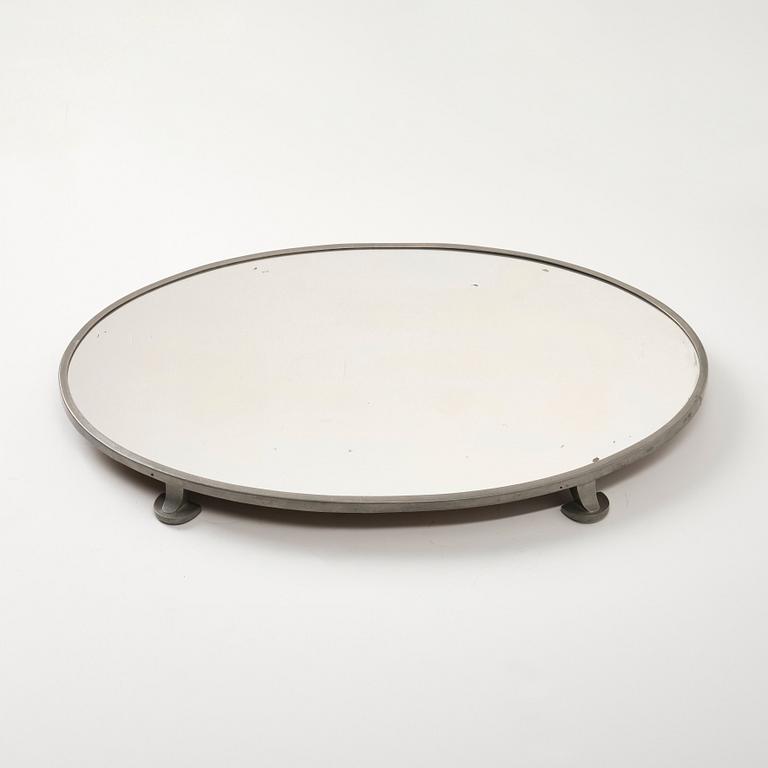 Firma Svenskt Tenn, a pewter and mirror glass surtout de table model "934 a", Stockholm 1931.