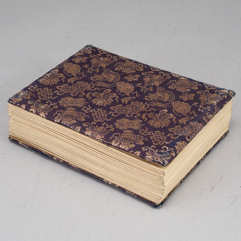 Two signed photographs of the Japanese crown prince and his wife and a photo album.