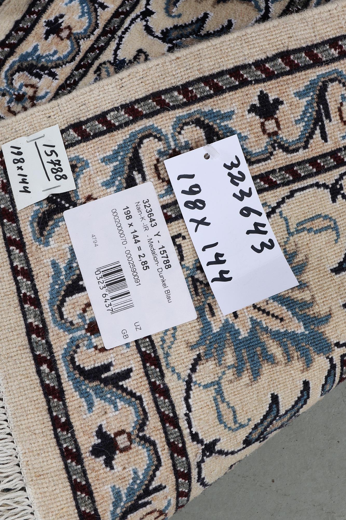 A rug, Nain, part silk, ca 198 x 144 cm.