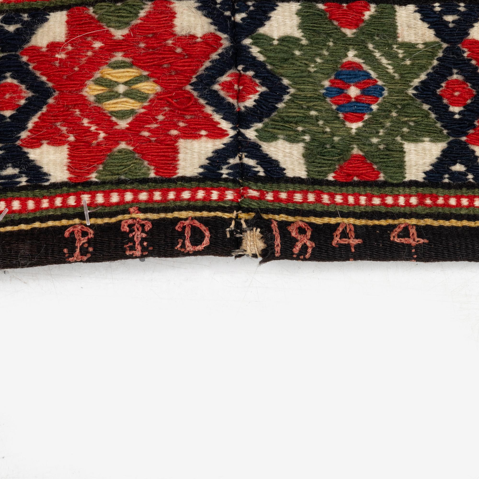 A flat-weave (krabbasnår) bed cover, c. 215 x 118 cm, South-West Scania, dated 1844.