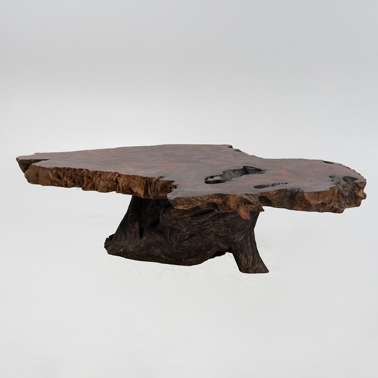 A wood coffee table.