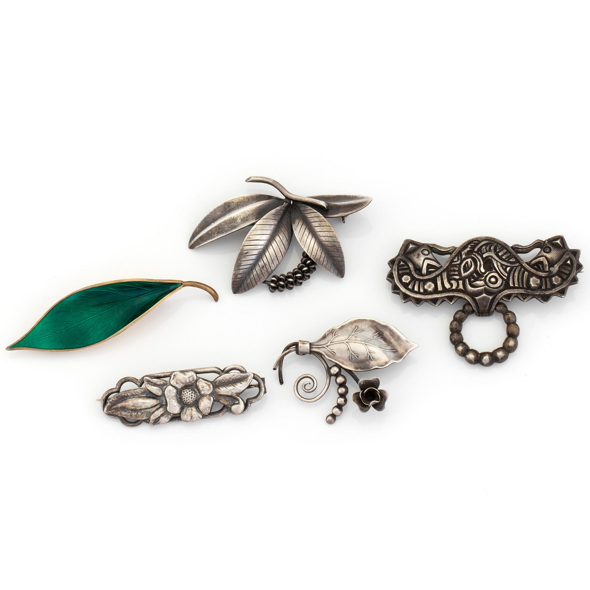 Five silver brooches including one by David Andersen, Norway.
