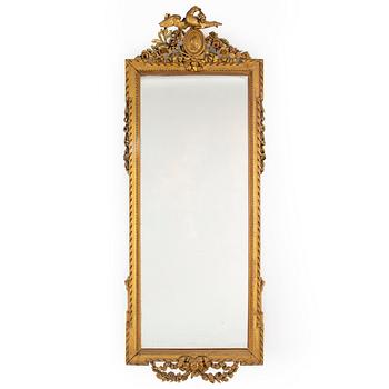 An end of the 19th Century Louis Xvi-style mirror.