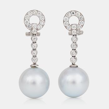 718. A pair of culltured South Sea pearl and brilliant-cut diamond earrings.