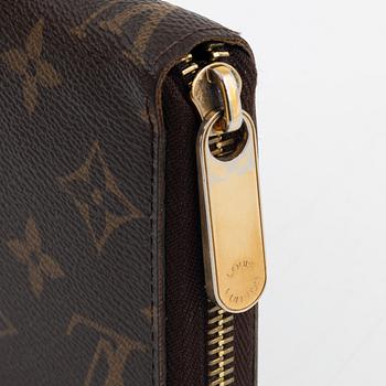 Louis Vuitton, A monogram canvas 'Zippy' wallet, 2009.