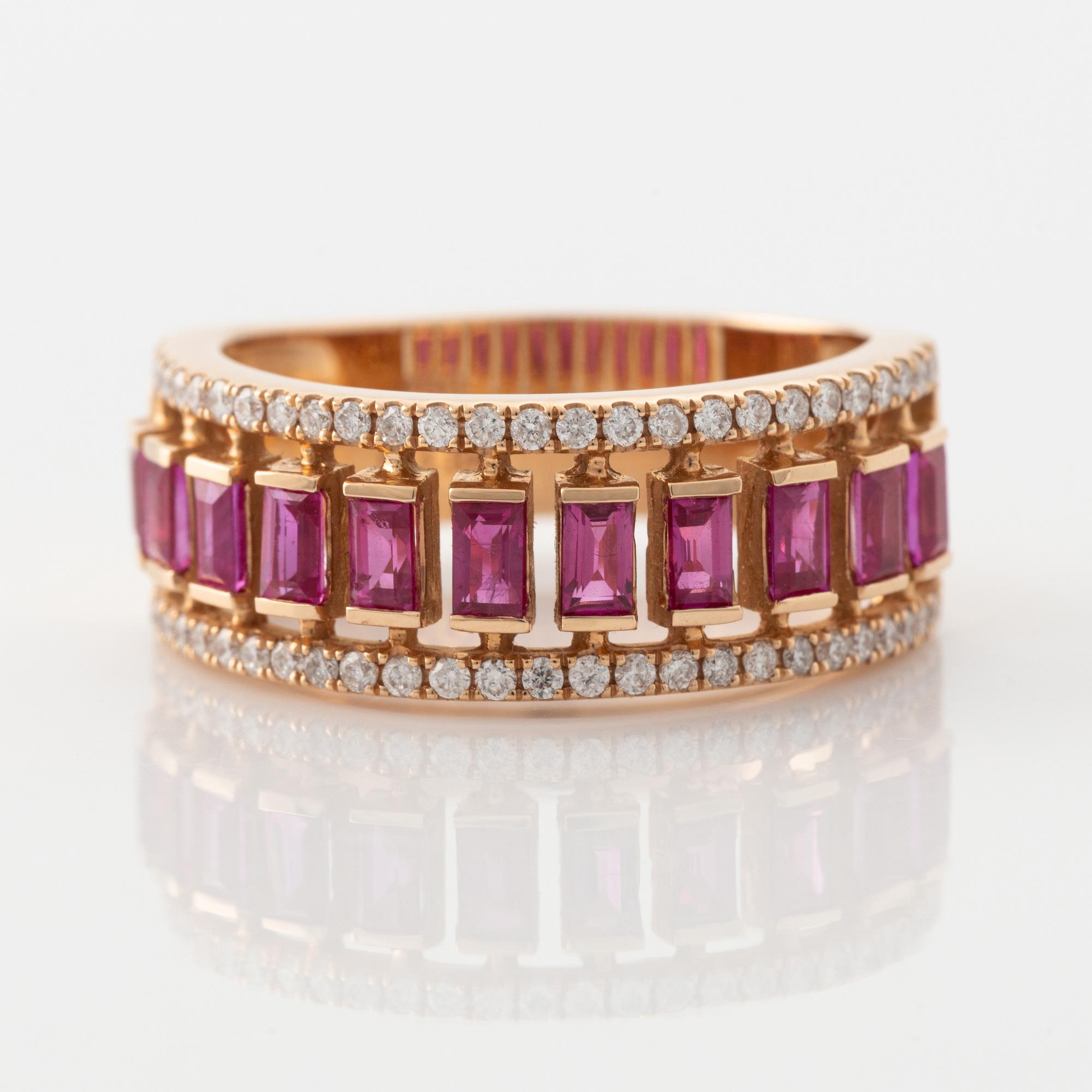 Step cut ruby and brilliant cut diamond ring.