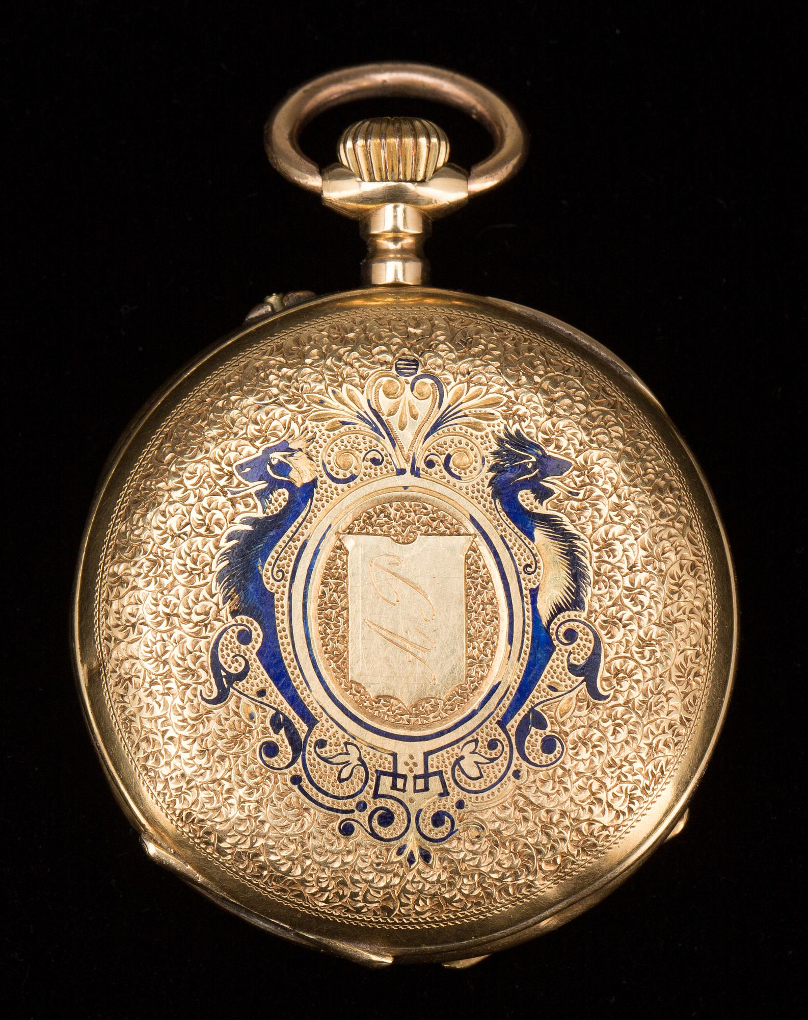 DAMFICKUR, 18 k guld samt blå emalj, 1890-tal. Totalvikt ca 30 g.
