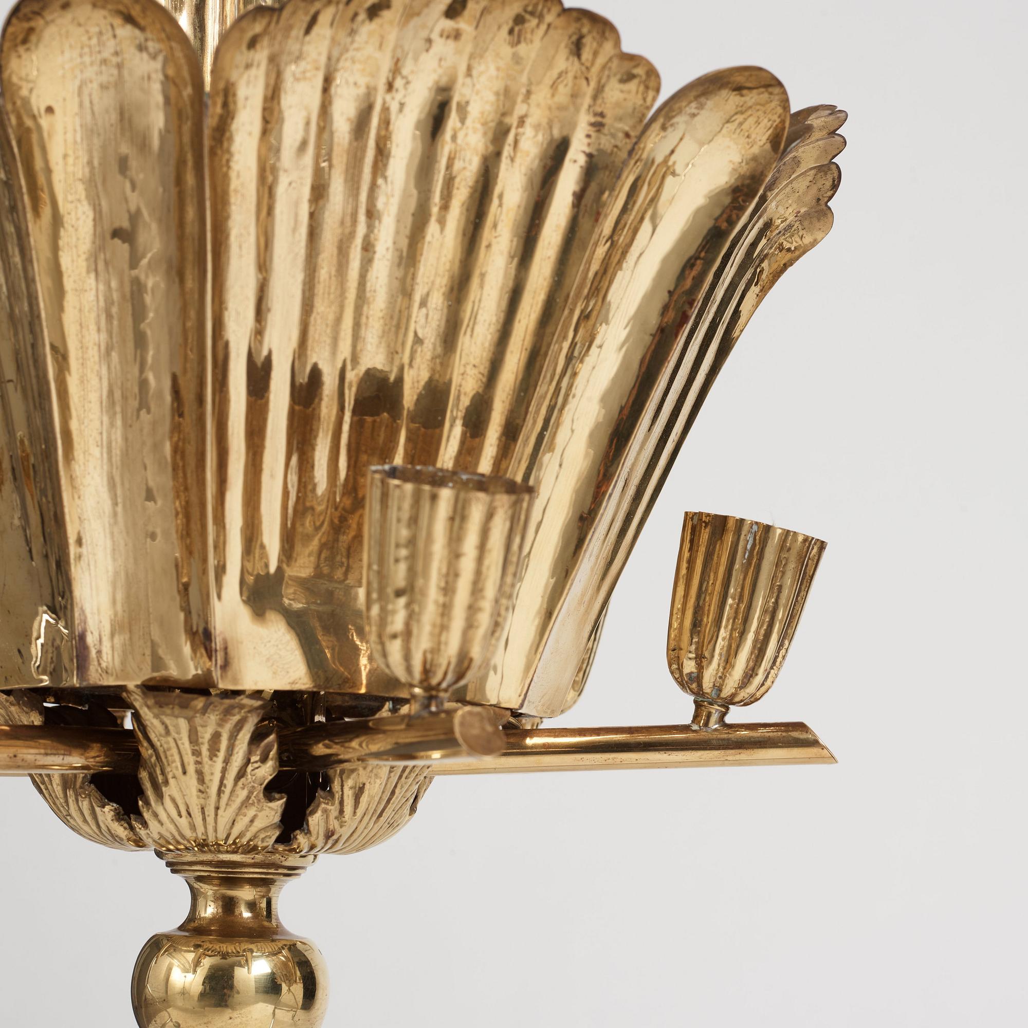 A.W. Borgh, a pair of Swedish Grace brass chandeliers, probably 1920-1930's.
