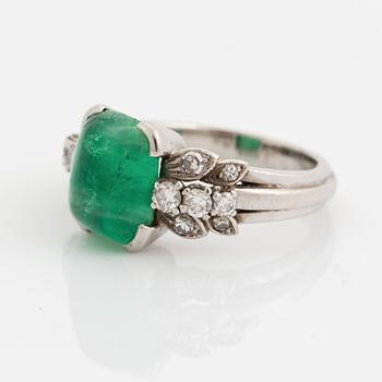 A WA Bolin 18K white gold ring set with a cabochon-cut emerald.