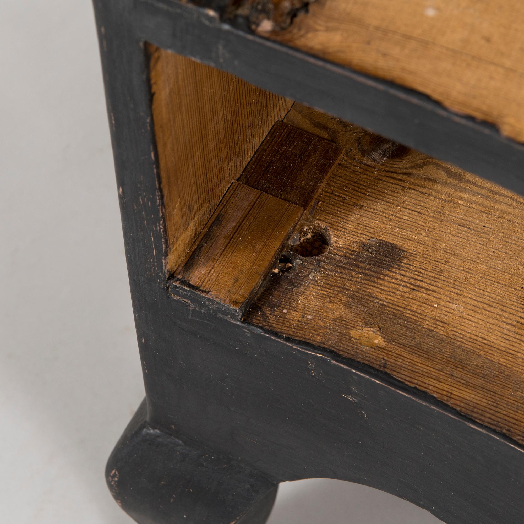 An 18th-Century chest of drawers.