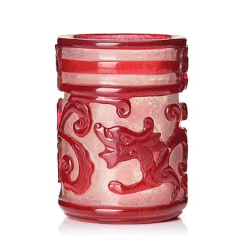 1166. A ruby red overlay Beijing glass 'chilong' brush pot, with a seal mark.