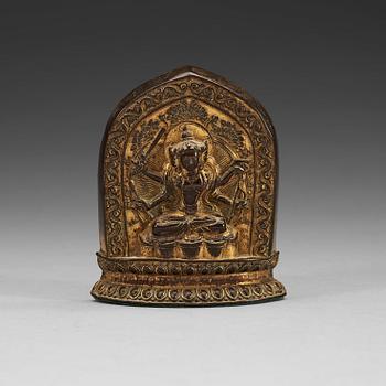 An embossed gilt copper alloy plaque of Bodhisattva Mañjughośa, Qianlong six character mark and period, 18th Century.